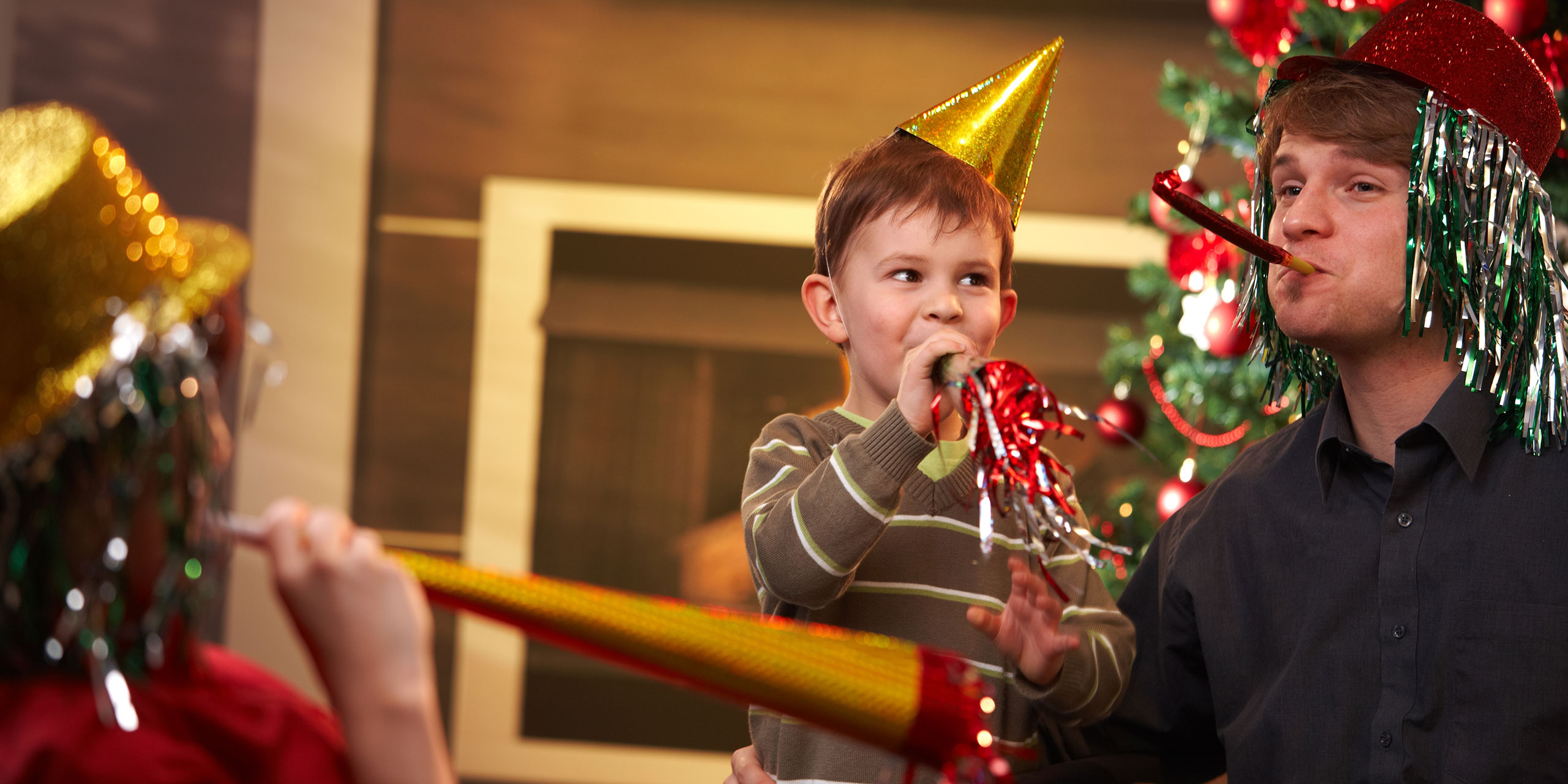 Family Celebrating New Year's Eve; Courtesy of StockLite/Shutterstock.com