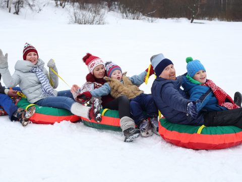 Snow Tubing; Courtesy of Pavel L Photo and Video/Shutterstock.com