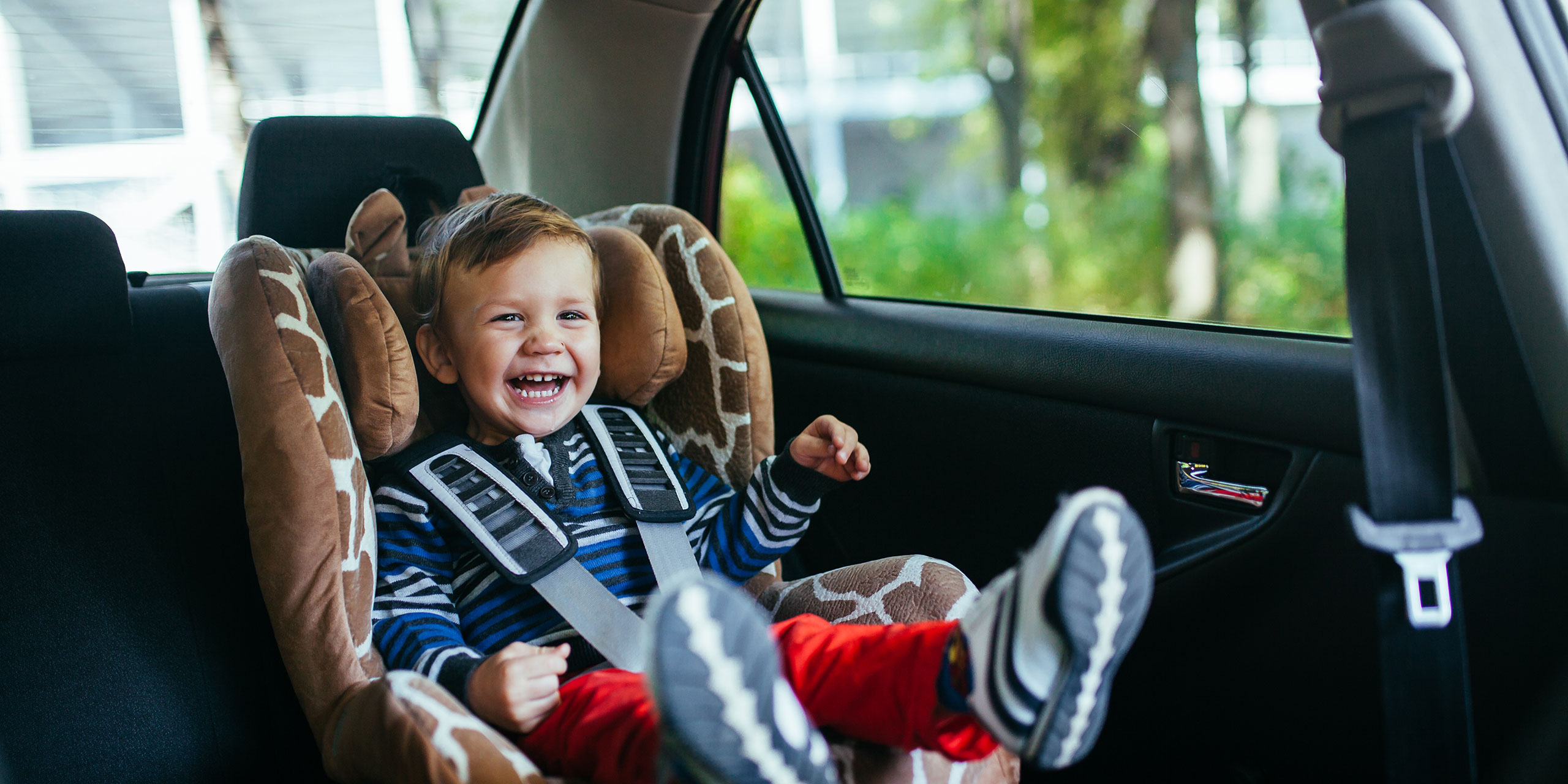 Toddler in Car Seat; Courtesy of David Tadevosian/Shutterstock.com