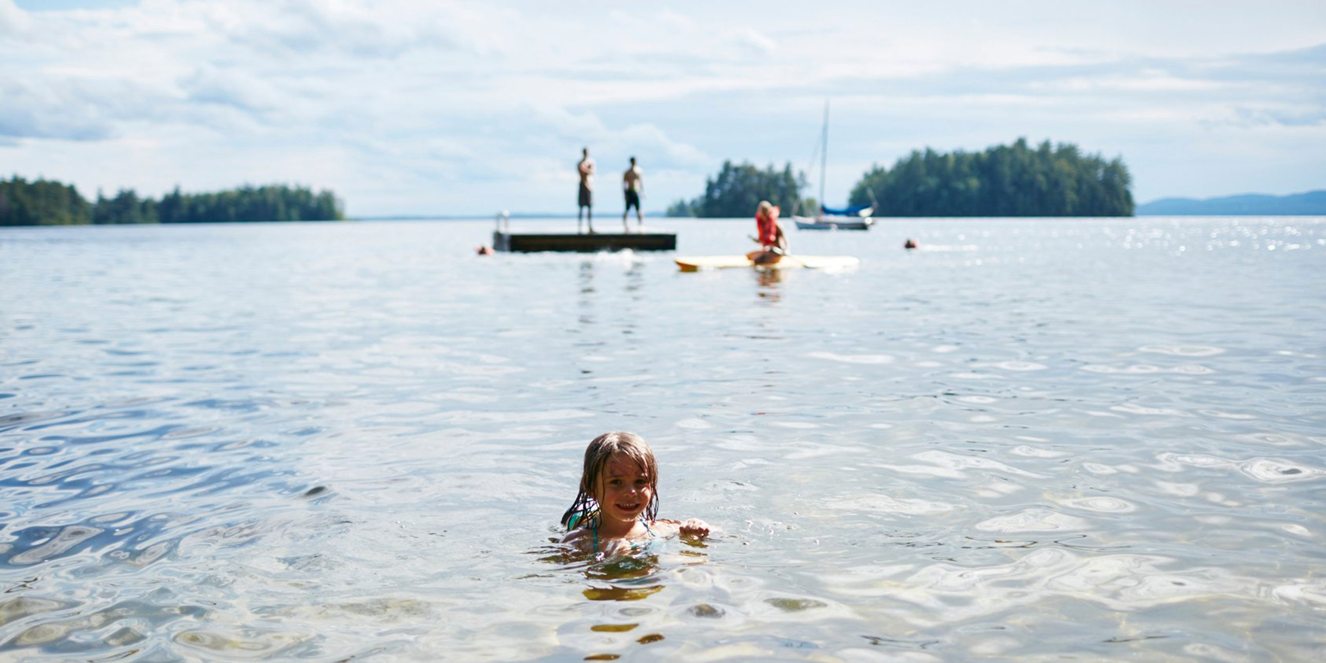 Little Girl Swimming at Migis Lodge in South Casco, ME; Courtesy of Migis Lodge
