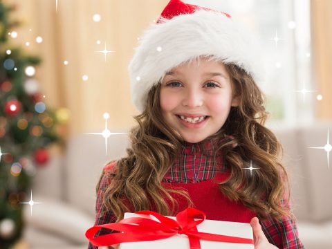 Tween Girl at Christmas; Courtesy of wavebreakmedia/Shutterstock.com