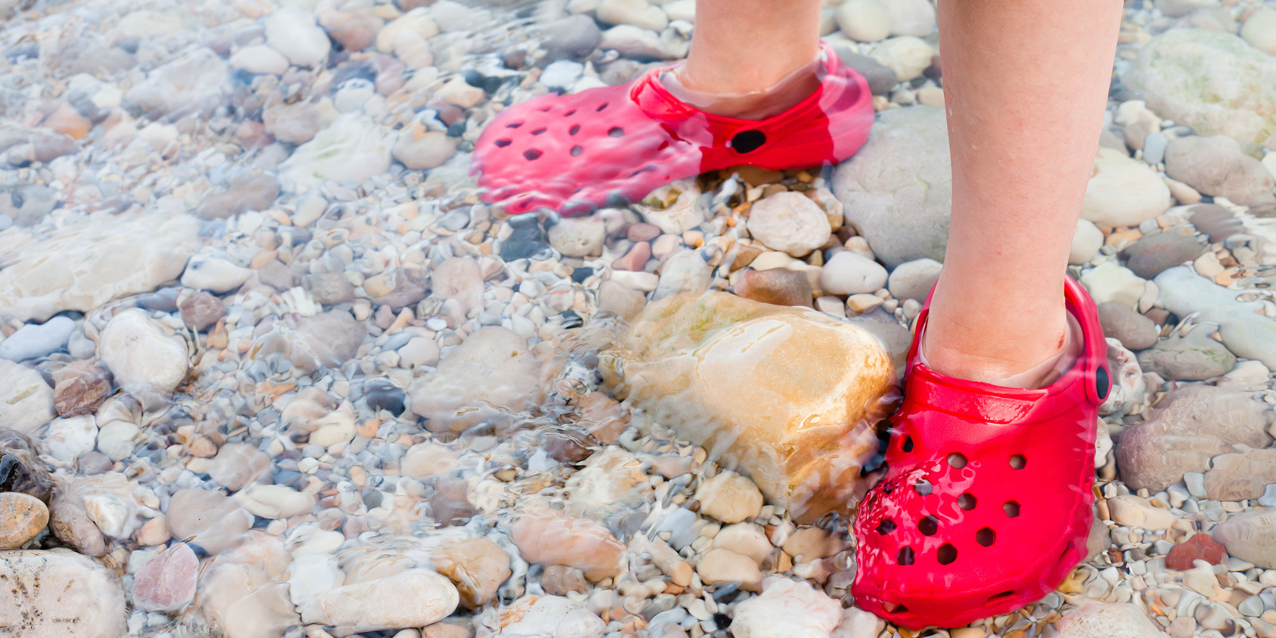 Kids Crocs in Water; Courtesy of Tom Gowanlock/Shutterstock.com