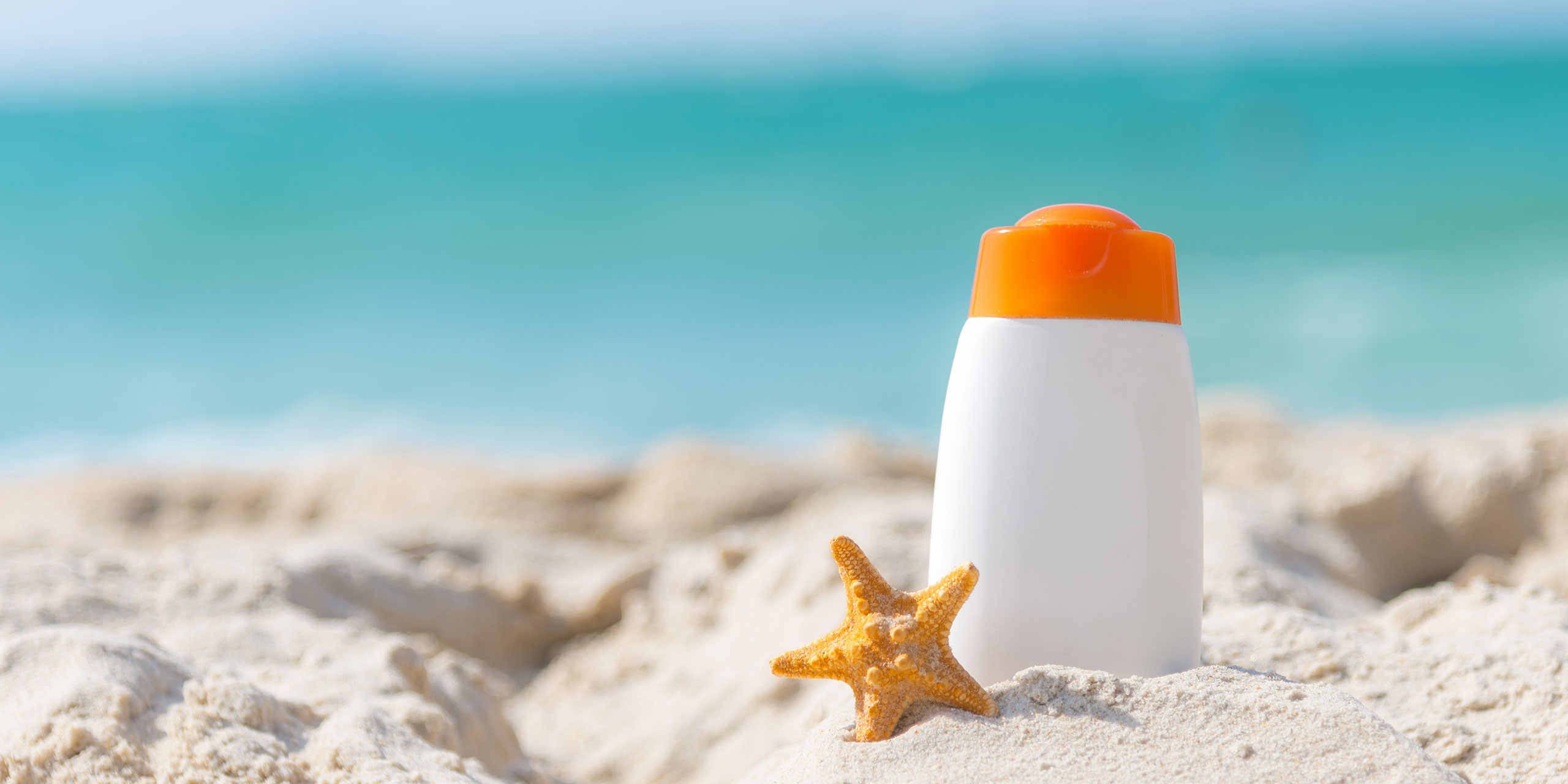 Sunscreen on Beach; Courtesy of Freebird797/Shutterstock.com