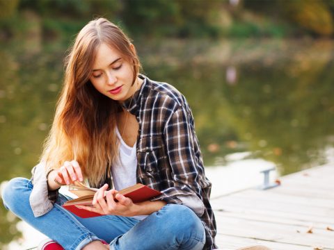 Teen Reading; Courtesy of George Dolgikh/Shutterstock.com