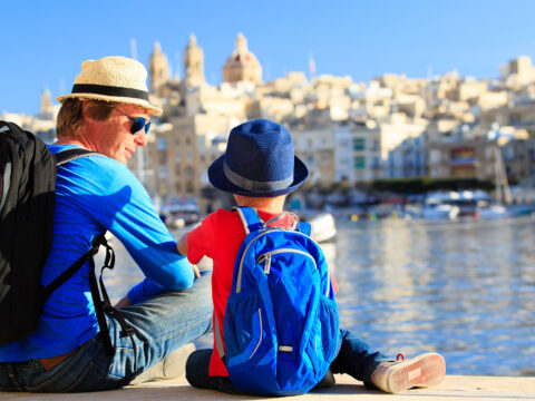 Father and Son on European Vacation; Courtesy of NadyaEugene/Shutterstock.com