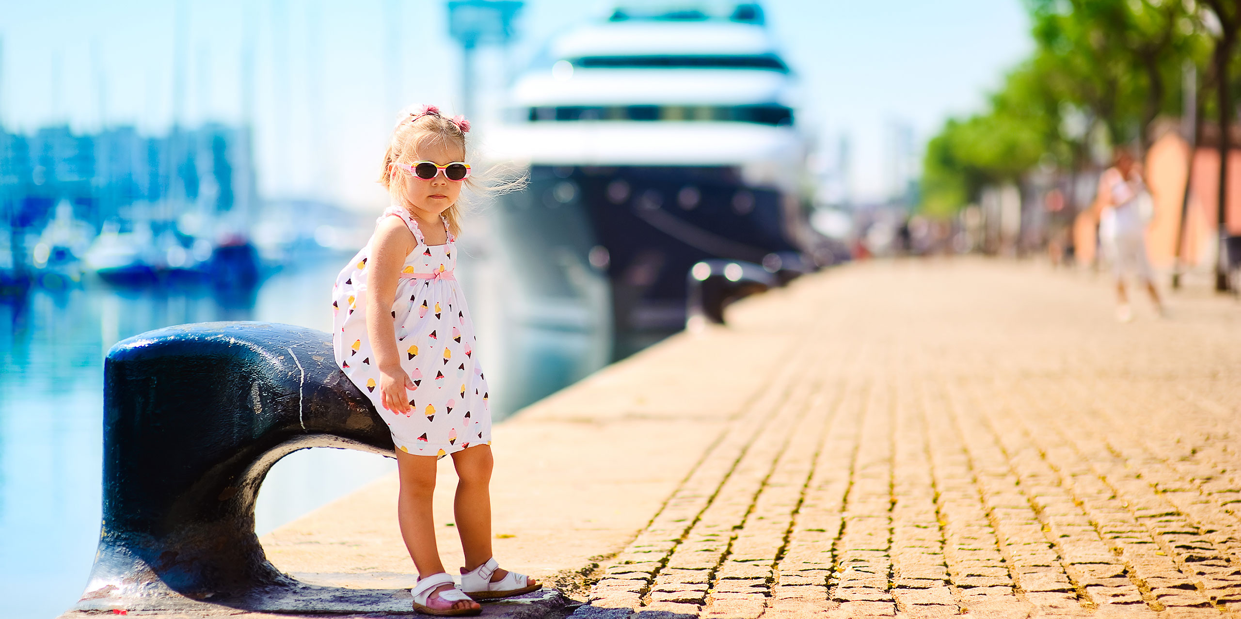 Little Girl in Cruise Port; Courtesy of Natalia Kirichenko/Shutterstock.com