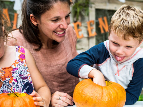 Young kids carving Halloween; Courtesy of Rawpixel.com